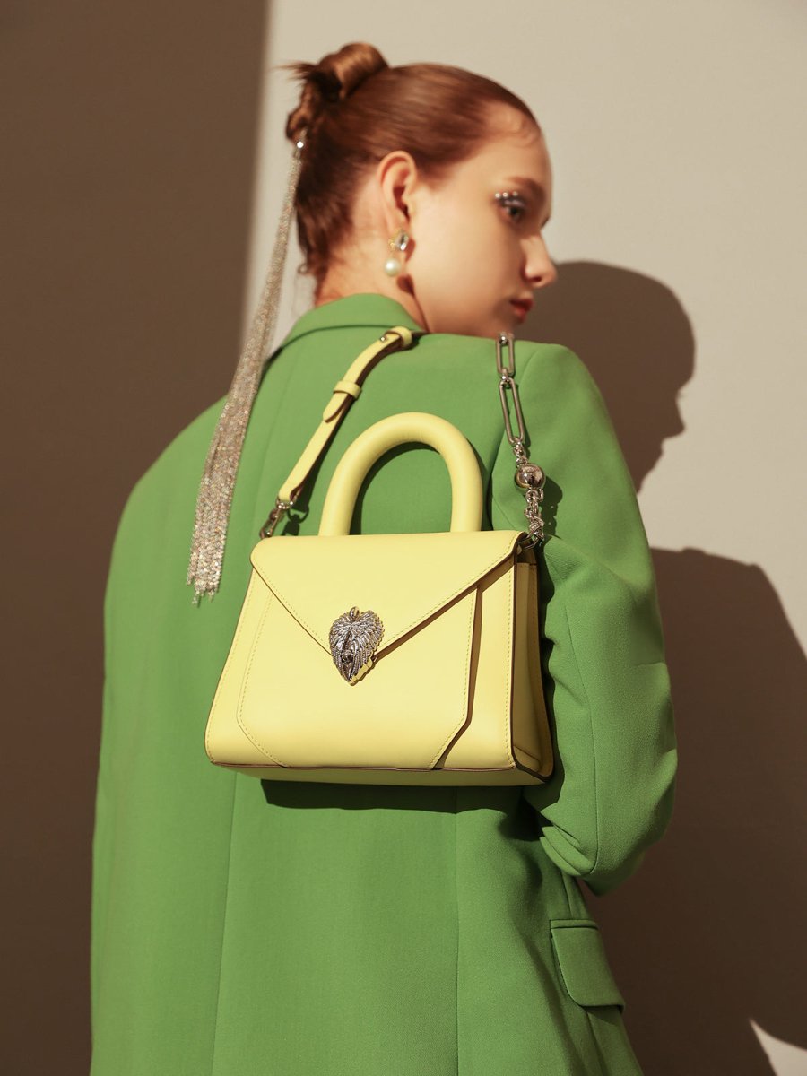Avant Garde Silver Chain Strap Leather Top Handle Bag – Swan Handle Calfskin Bag with Ornate Lion Clasp