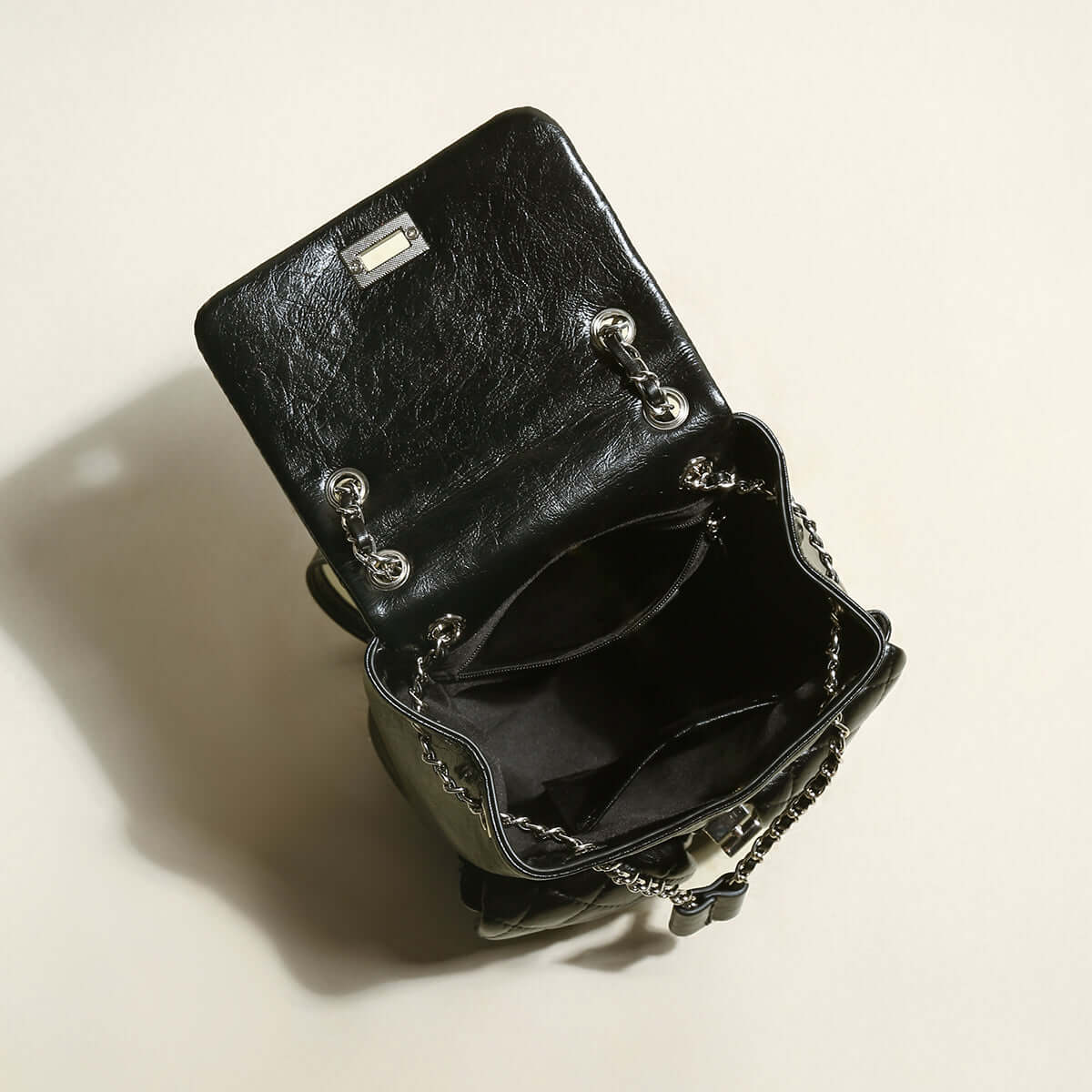 multi pocket chainstrap quilted backpack black 4