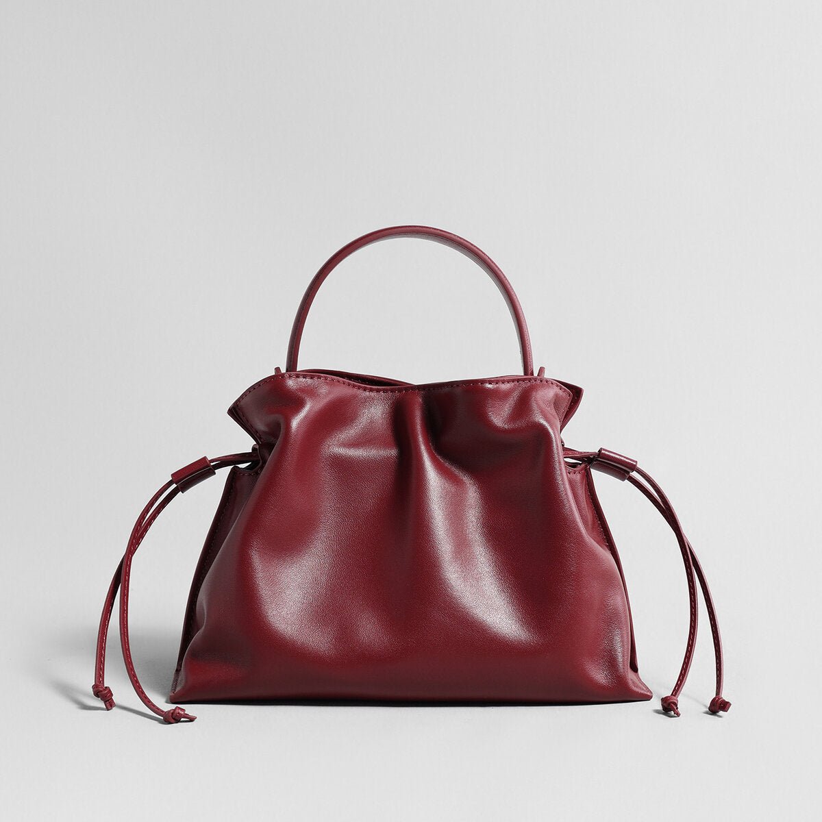 Soft Lambskin Leather Fortune Pouch Bag – Ruched Drawstring Design with Top Handle & Crossbody Strap