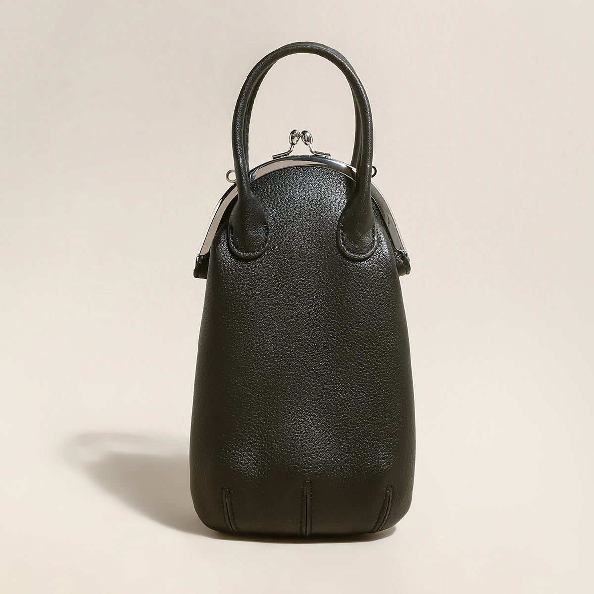 whimsical gourd leather ball clasp top handle bag black 1