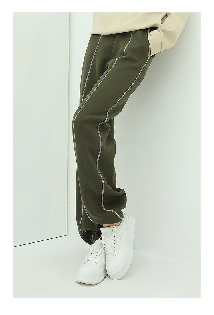 airy green sweater pants with contrast piping details all green 2