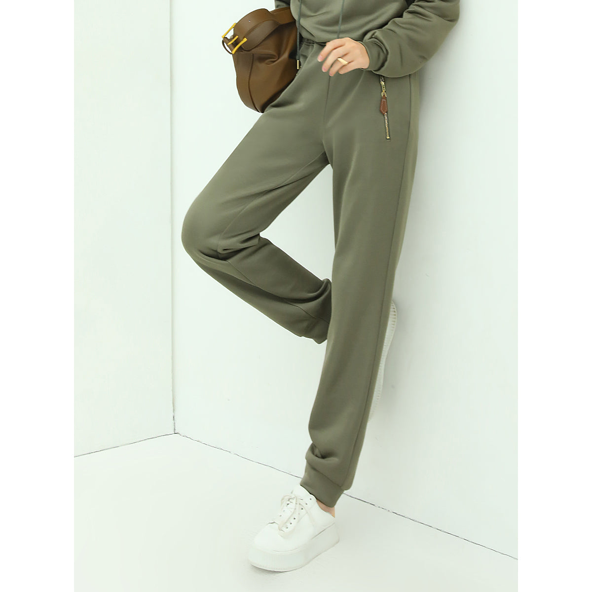 athletic green sweater pants with zip pocket details all green 2