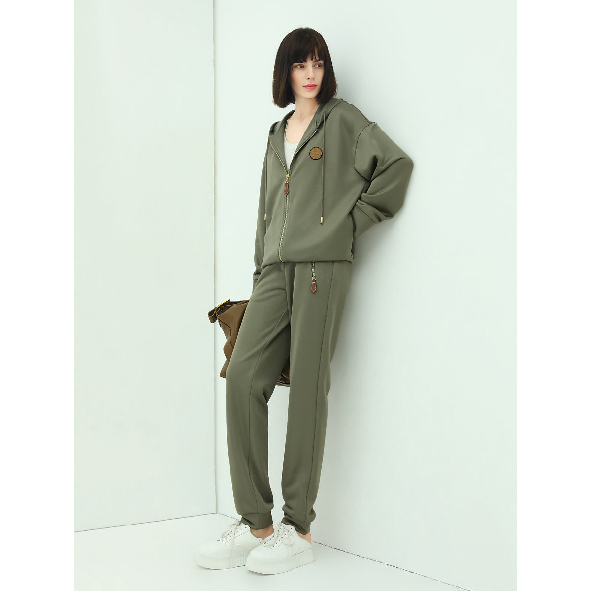 athletic green sweater pants with zip pocket details all green 3