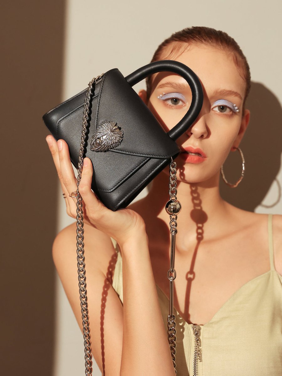 Avant Garde Silver Chain Strap Leather Top Handle Bag – Swan Handle Calfskin Bag with Ornate Lion Clasp