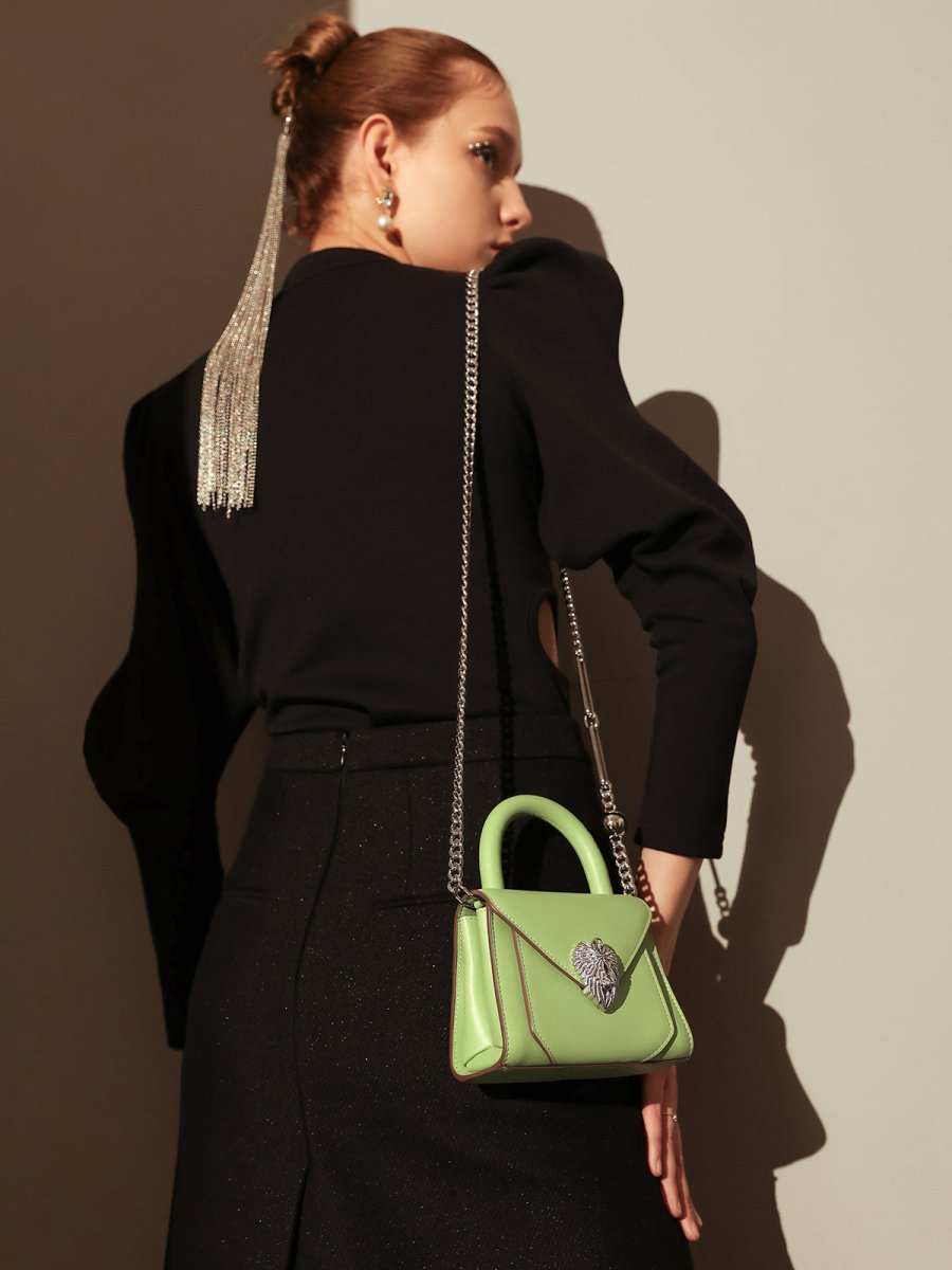 Avant Garde Silver Chain Strap Leather Top Handle Bag – Swan Handle Calfskin Bag with Ornate Lion Clasp