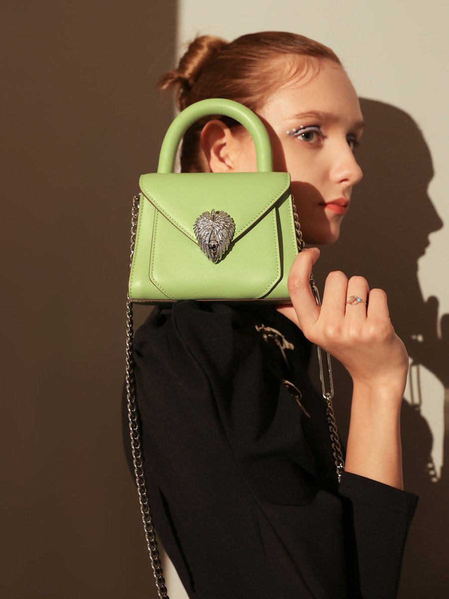 Avant Garde Silver Chain Strap Leather Top Handle Bag – Swan Handle Calfskin Bag with Ornate Lion Clasp