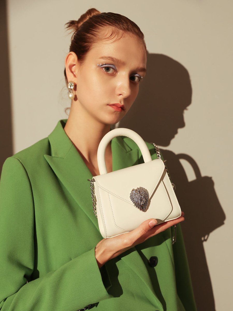 Avant Garde Silver Chain Strap Leather Top Handle Bag – Swan Handle Calfskin Bag with Ornate Lion Clasp