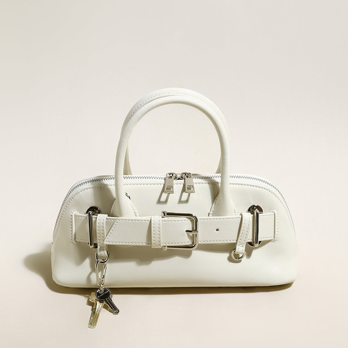baguette belted clasp top handle bag white 1