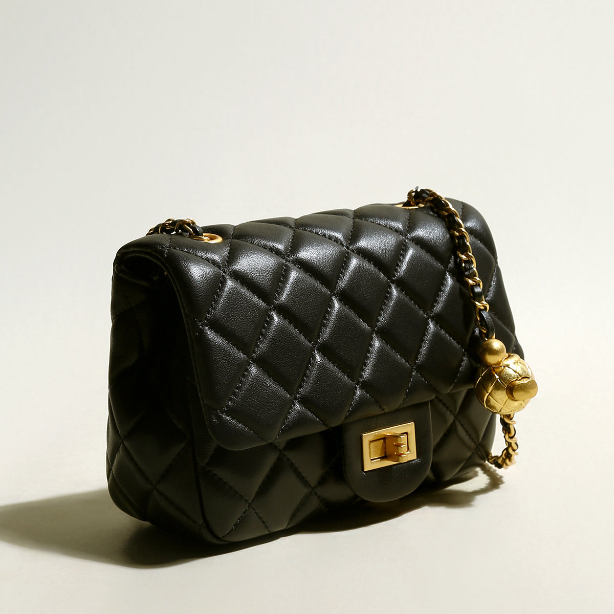 black-quilted-bag-with-golden-ball-leather-chain-straps_black_2.jpg