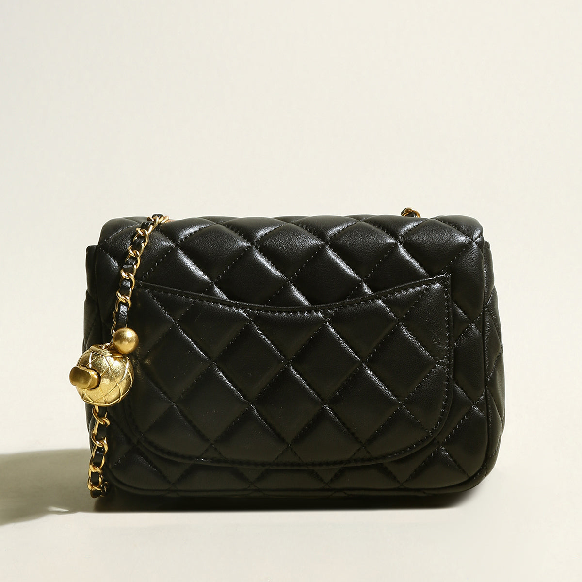 black-quilted-bag-with-golden-ball-leather-chain-straps_black_3.jpg