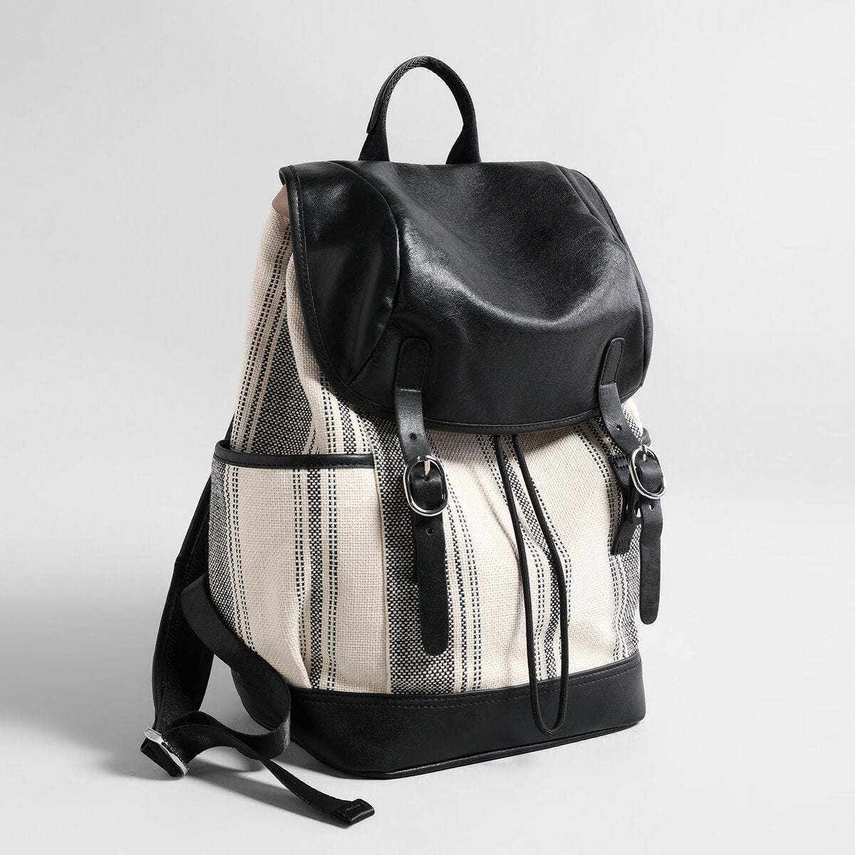 Canvas & Leather Drawstring Backpack – Large-Capacity Flap Daypack with Side Pockets