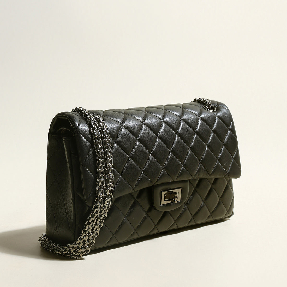 capacious-black-quilted-bag-with-metallic-chain-straps_black_2.jpg