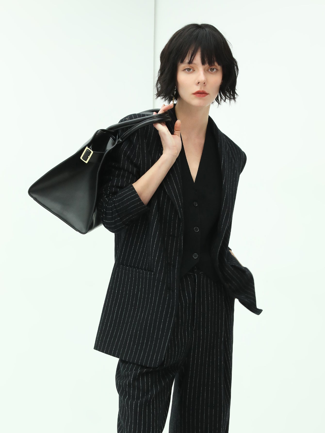 classic-black-pinstripe-tailored-blazer_all_black_3.jpg