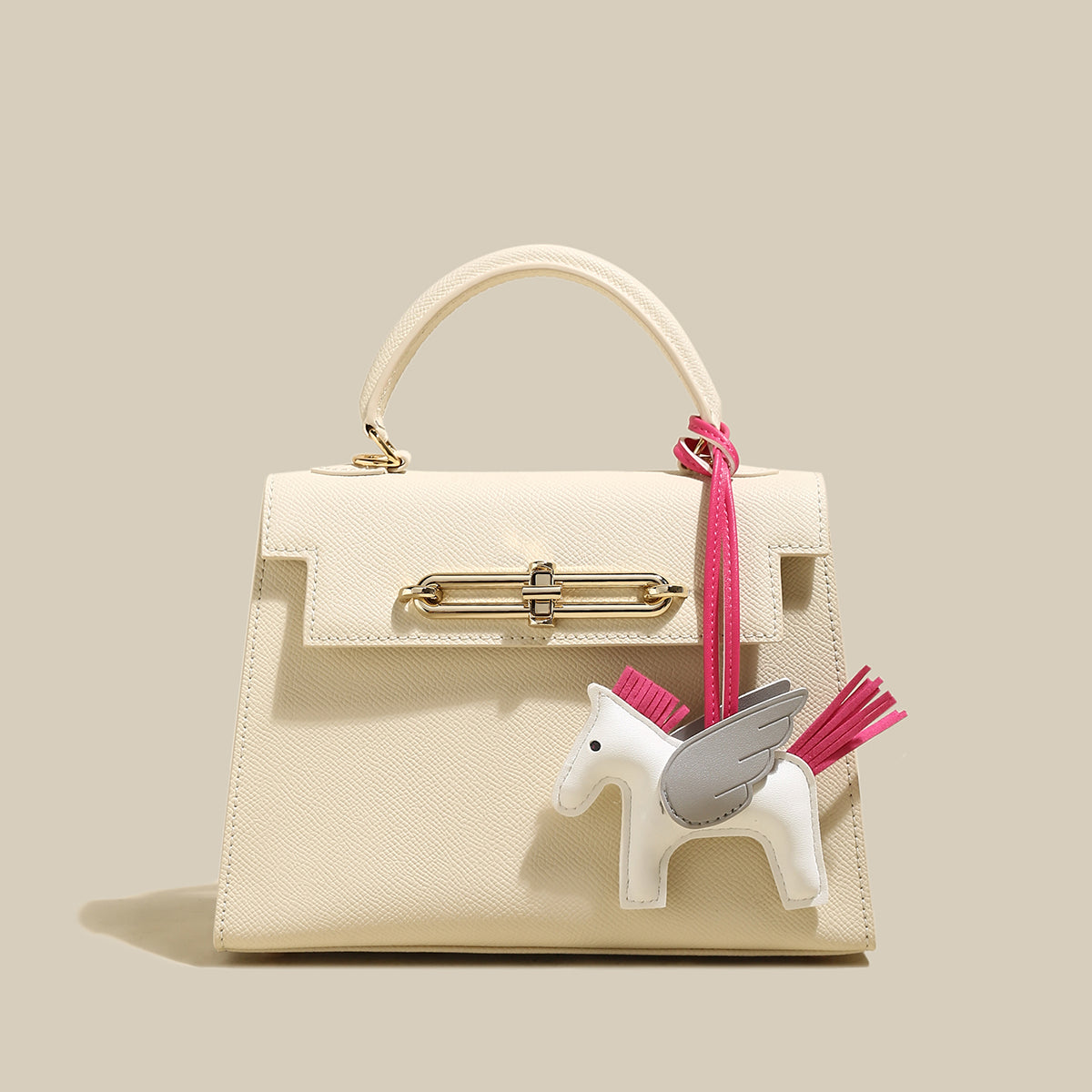 classic-handbag-with-a-unicorn-bag-charm_ivory_1.jpg