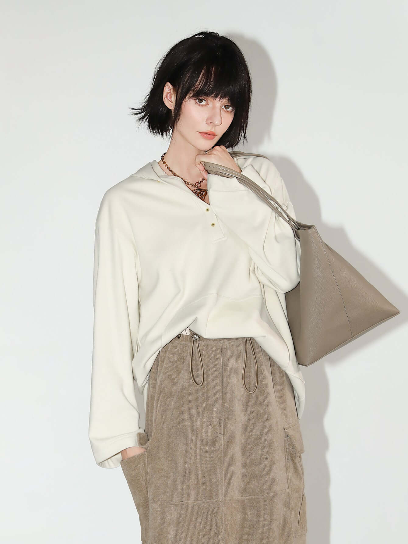 classic hooded sweater with gold buttons all beige 3