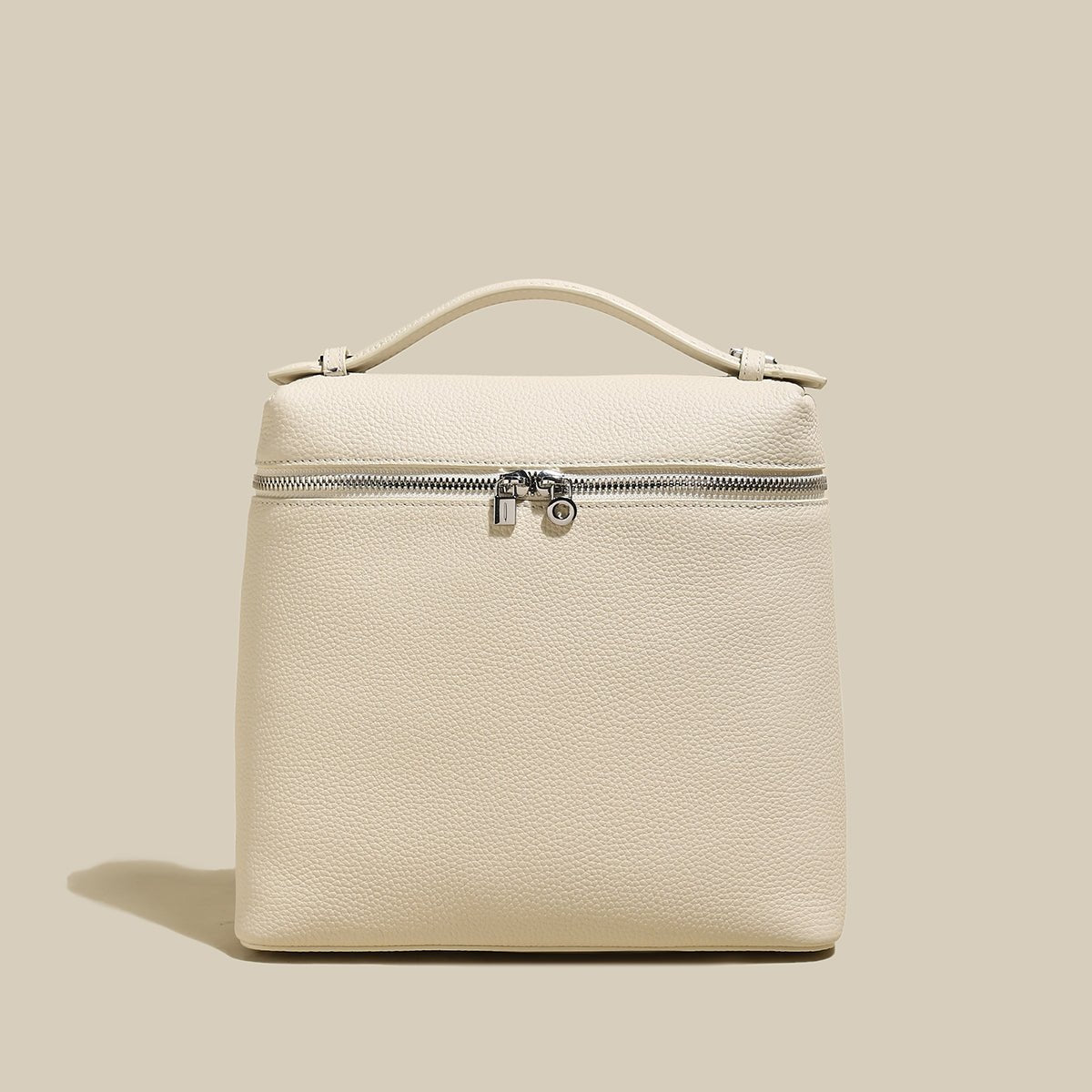 Convertible Pebbled Leather Backpack – Trapezoid Top-Handle Bag with Double Zip & Padlock Detail