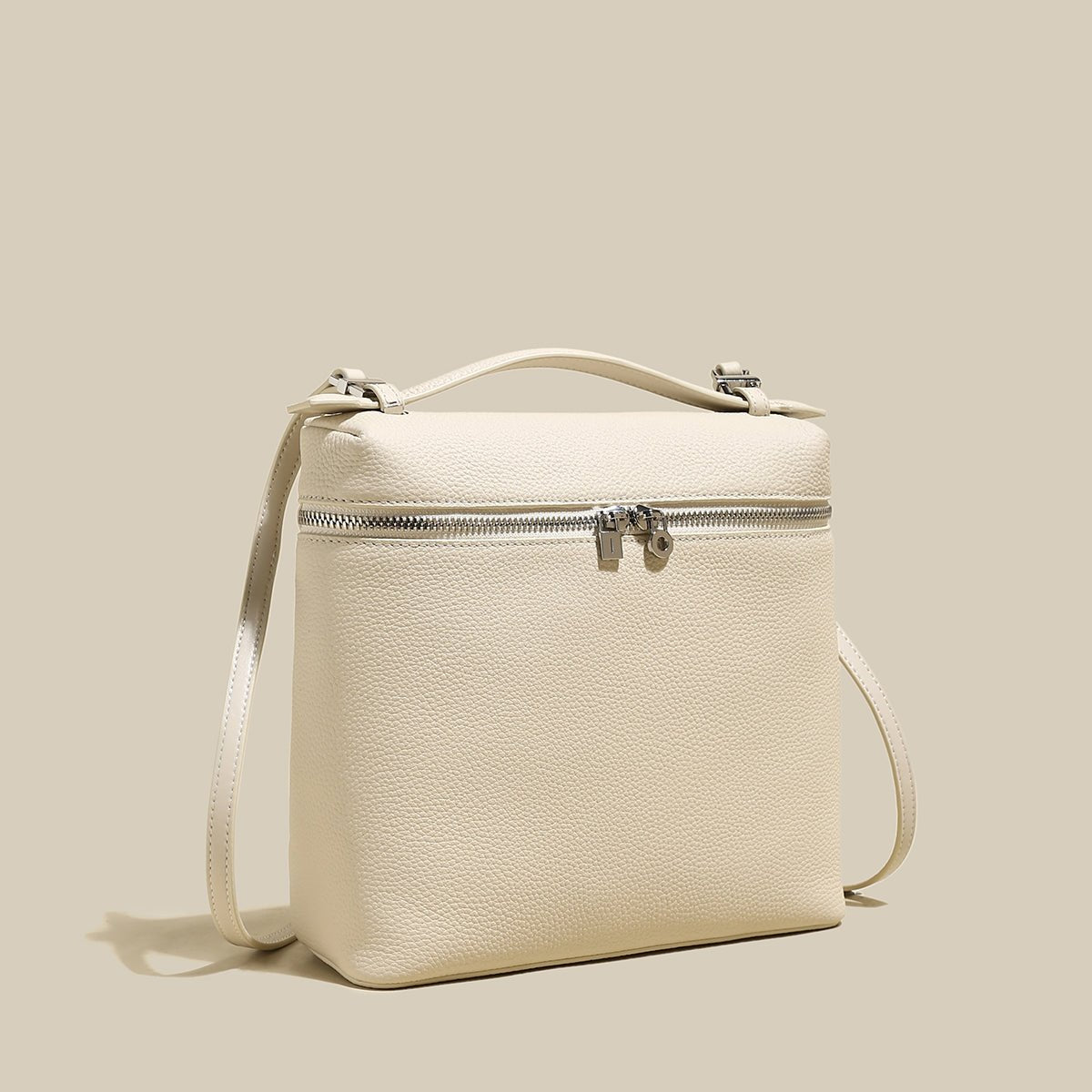 Convertible Pebbled Leather Backpack – Trapezoid Top-Handle Bag with Double Zip & Padlock Detail