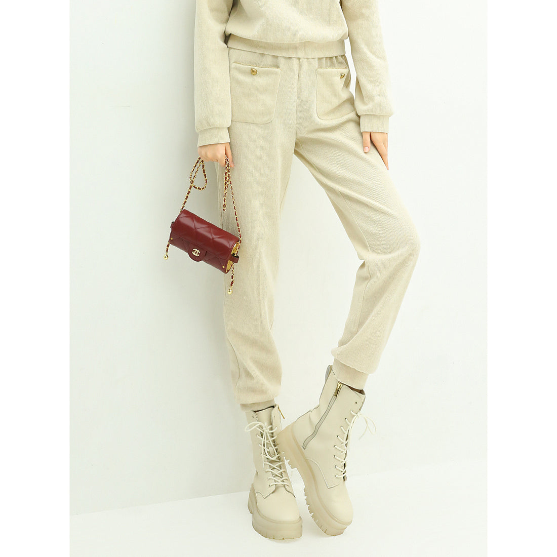 cream-knitted-sweater-pants-with-gold-snap-buttons_all_cream_1.jpg