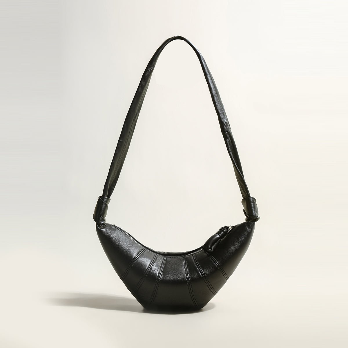 Croissant Chic Shoulder Bag – Sculptural Pleated Goatskin Leather Crescent Bag with Knotted Strap Detail