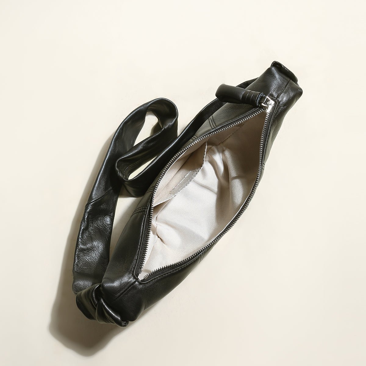 Croissant Chic Shoulder Bag – Sculptural Pleated Goatskin Leather Crescent Bag with Knotted Strap Detail