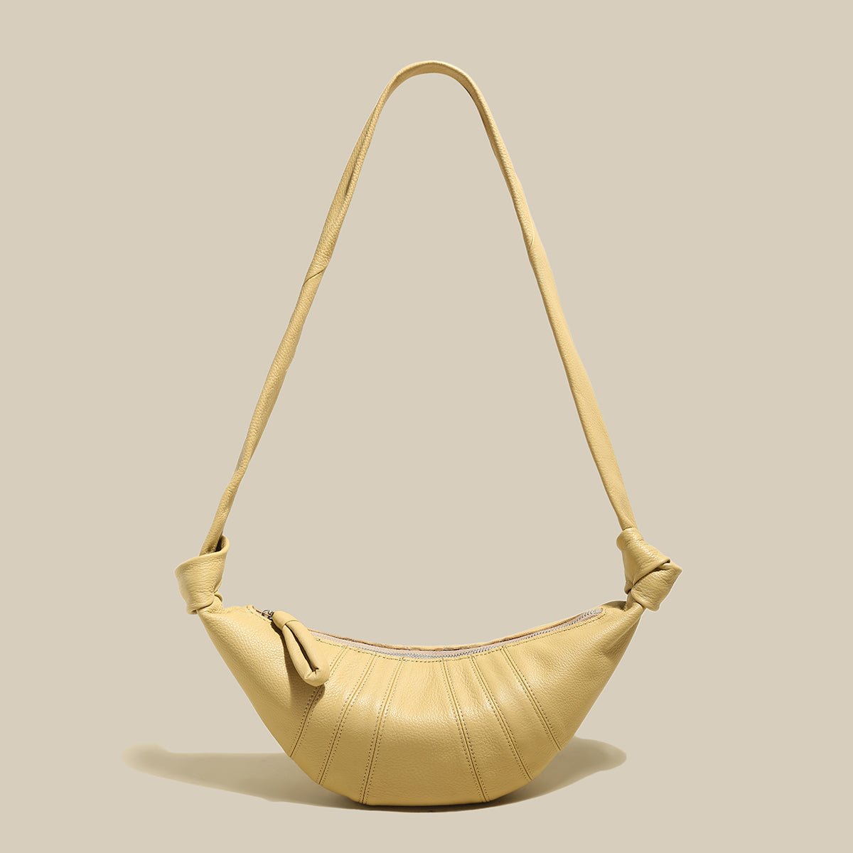 Croissant Chic Shoulder Bag – Sculptural Pleated Goatskin Leather Crescent Bag with Knotted Strap Detail