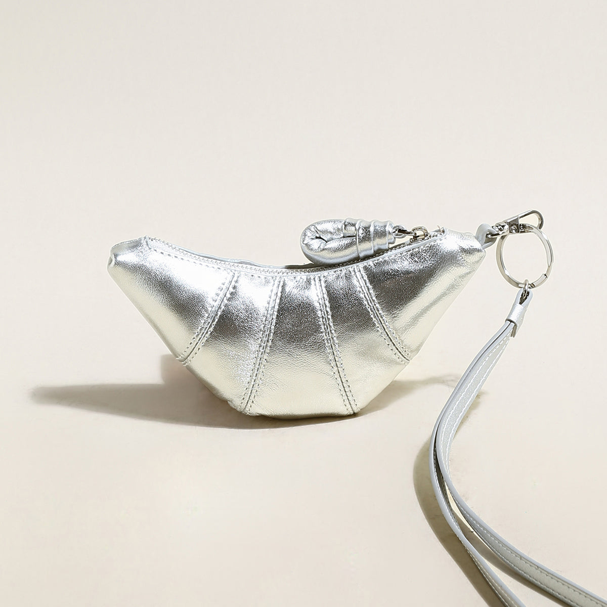 croissant clutch bag charm silver 1