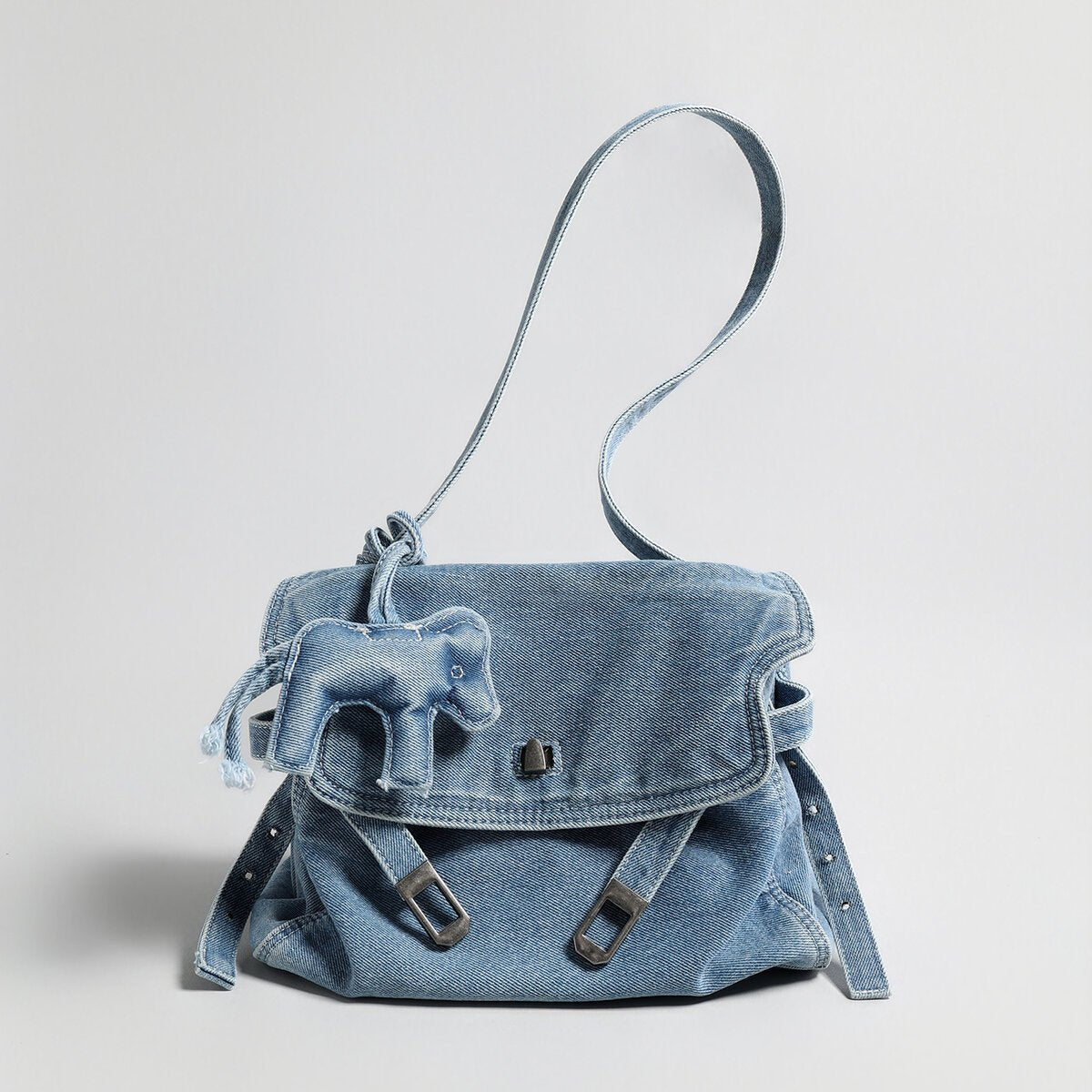 Distressed Denim Flap Crossbody – Elephant Charm Shoulder Bag with Buckle Details
