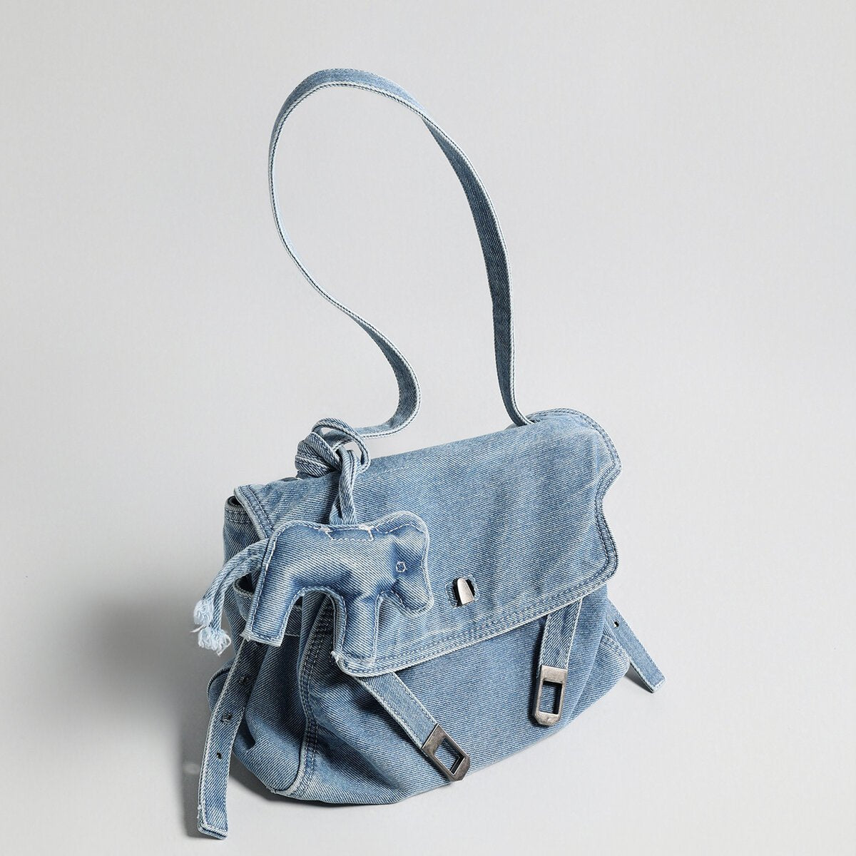 Distressed Denim Flap Crossbody – Elephant Charm Shoulder Bag with Buckle Details