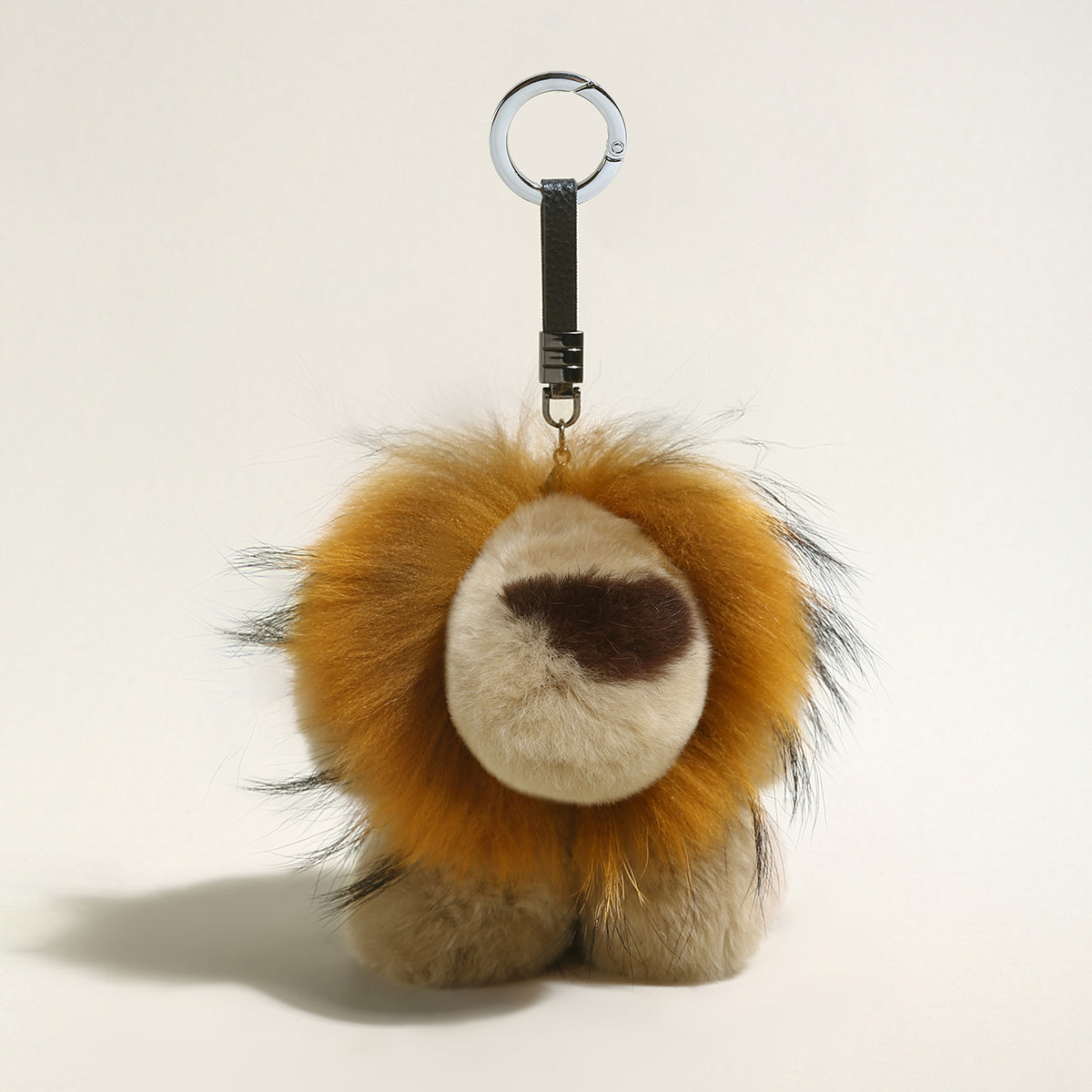 fluffy lion plushie bag charm gold 1