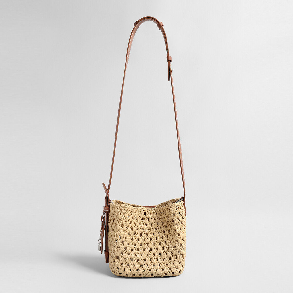 Handwoven Raffia Bucket Bag – Leather Charm Convertible Crossbody Bag