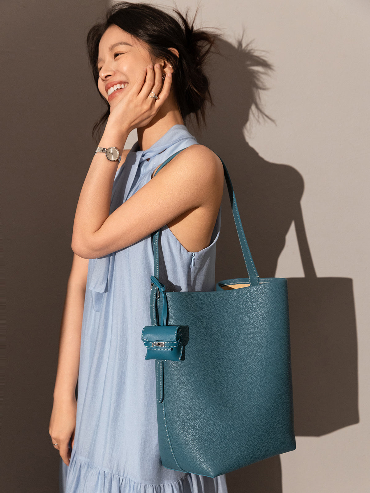 leather crafted airpods case wrist pouch blue 2