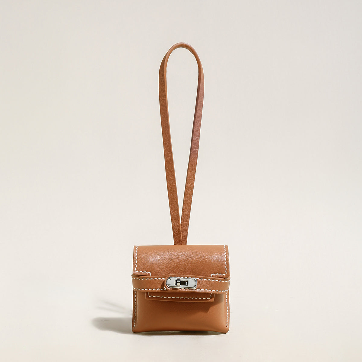 leather crafted airpods case wrist pouch brown 1