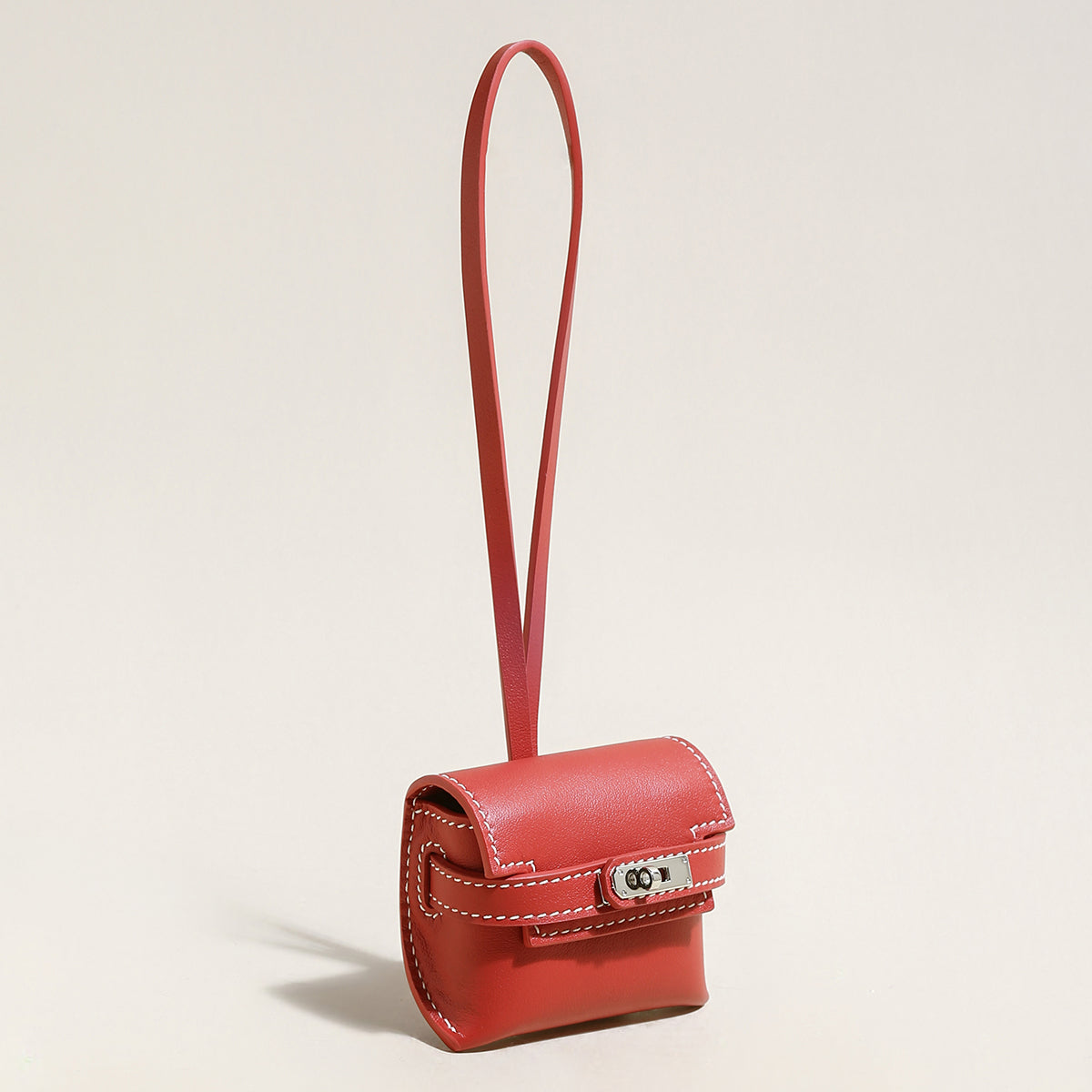 leather crafted airpods case wrist pouch red 2