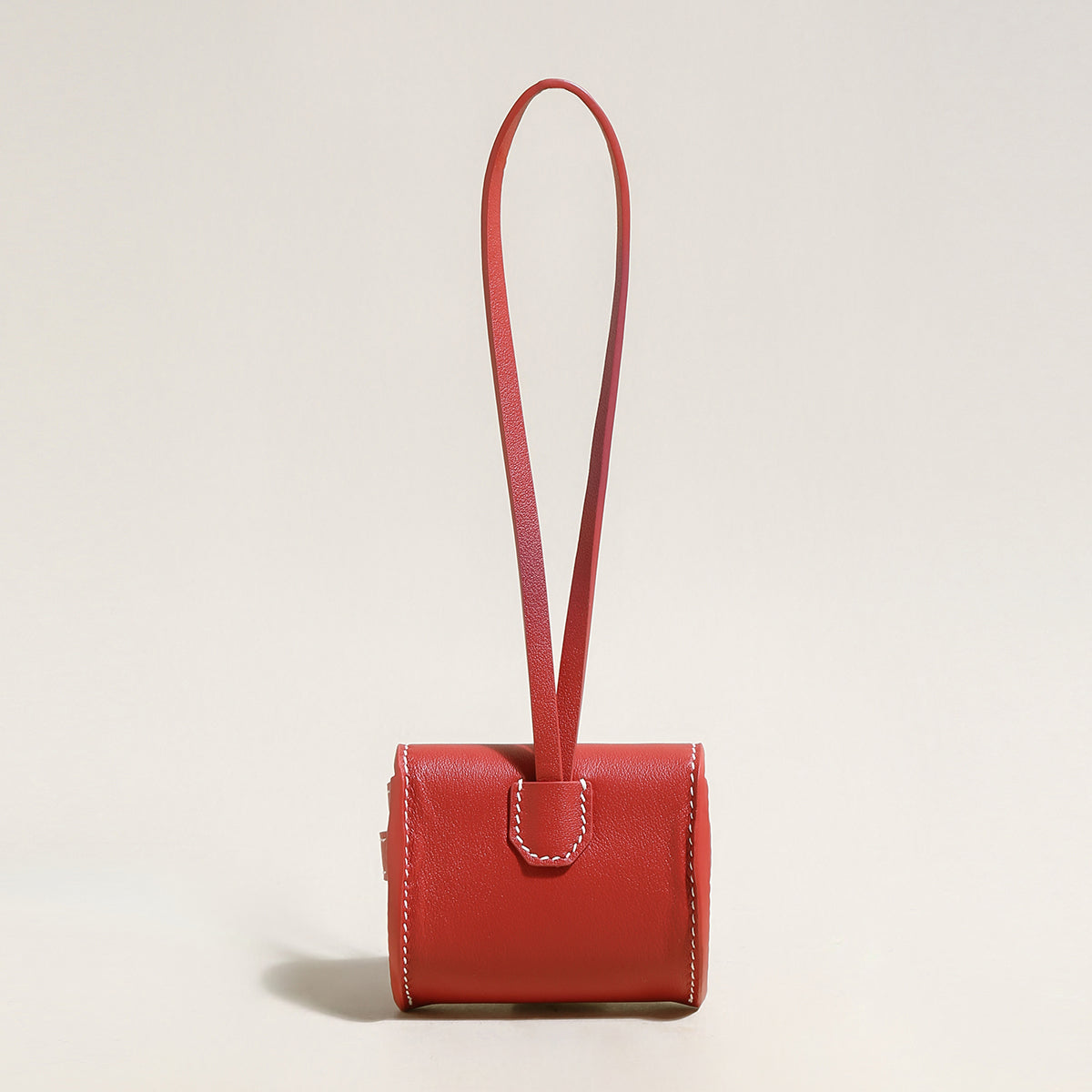 leather crafted airpods case wrist pouch red 3