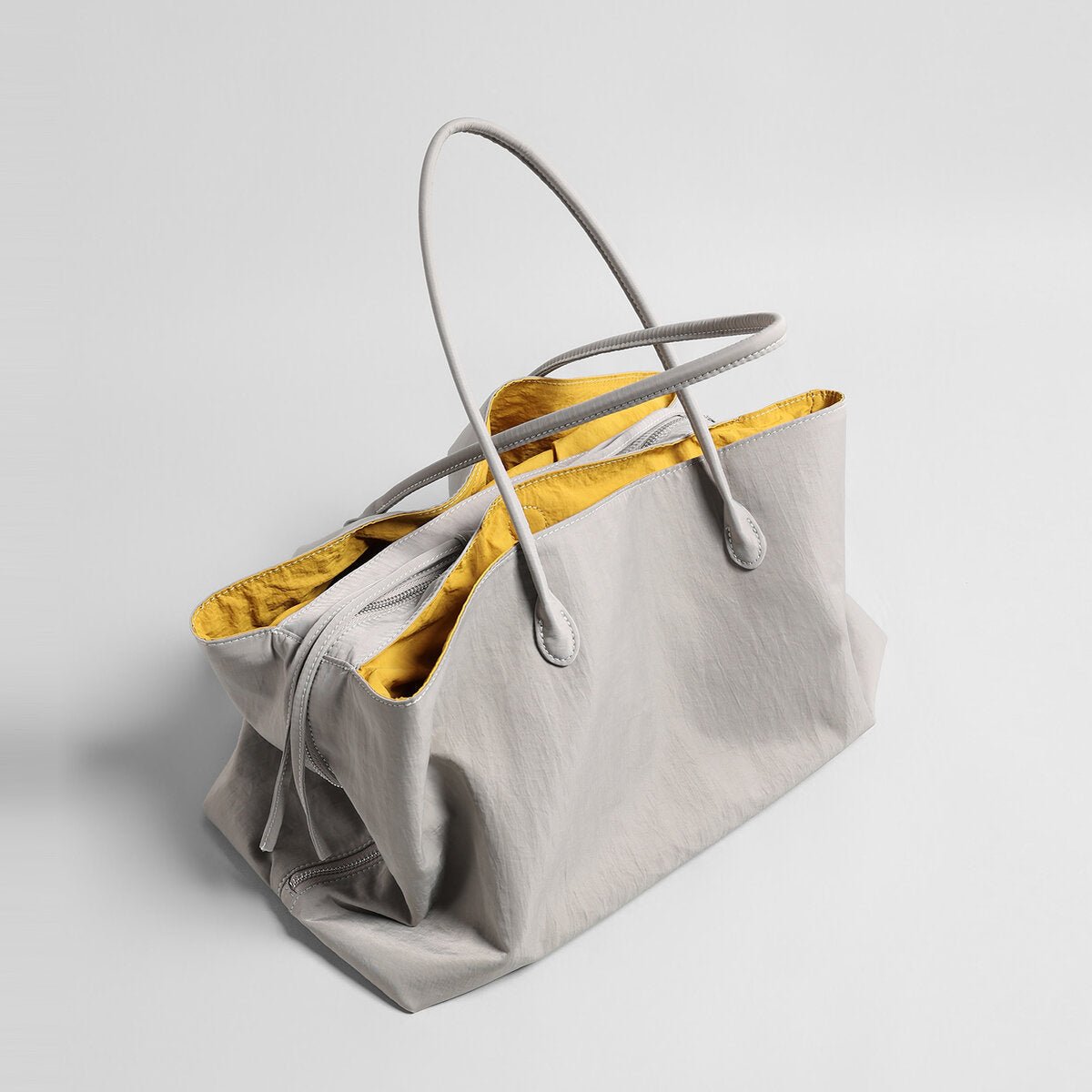 Lightweight Nylon Large Capacity Commuter Tote – Slouchy Triple-Compartment Bag with Fringe Detail