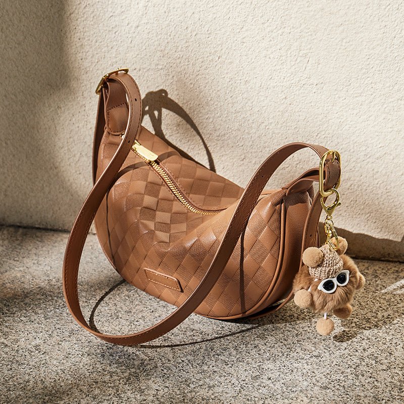 Luna Pompom Quilted Crescent Shoulder Bag