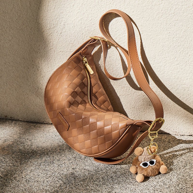 Luna Pompom Quilted Crescent Shoulder Bag