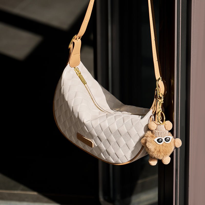 Luna Pompom Quilted Crescent Shoulder Bag