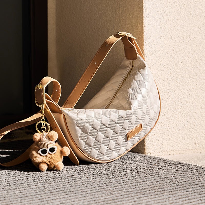 Luna Pompom Quilted Crescent Shoulder Bag