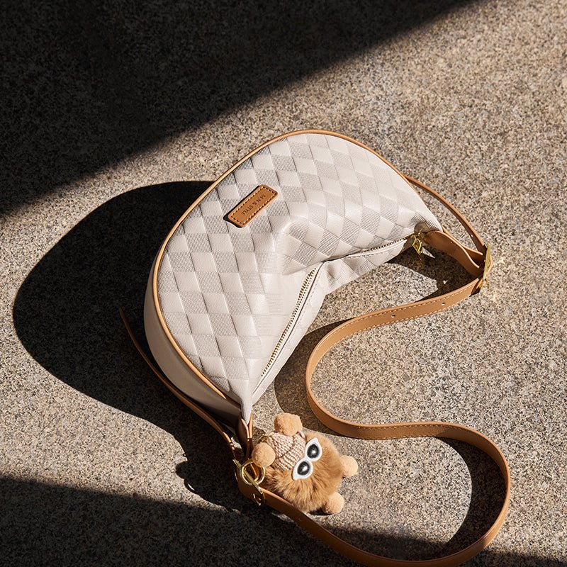 Luna Pompom Quilted Crescent Shoulder Bag