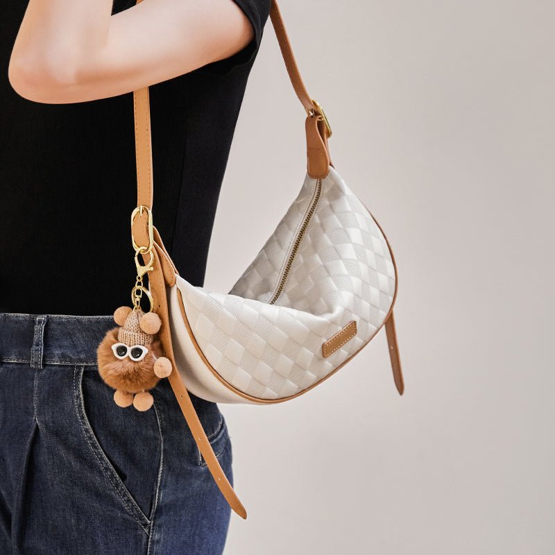 Luna Pompom Quilted Crescent Shoulder Bag