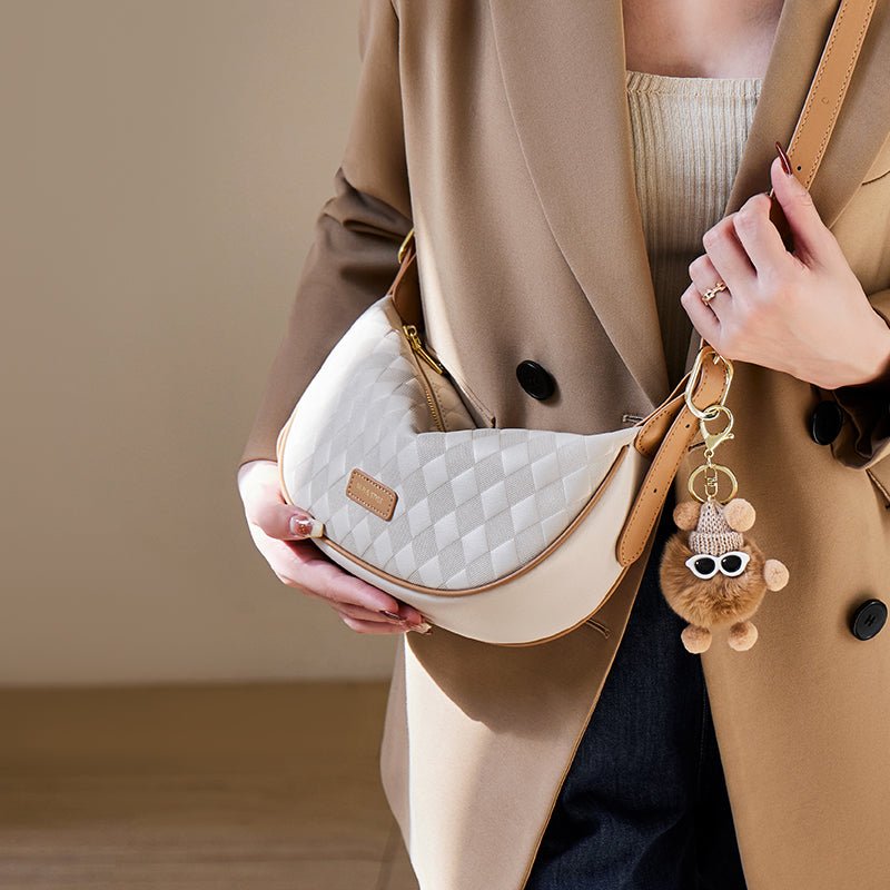 Luna Pompom Quilted Crescent Shoulder Bag