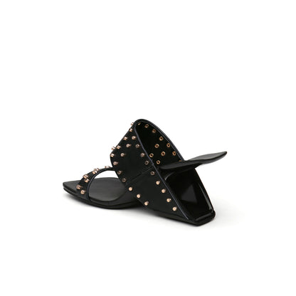 metal-embellished-heelless-mules_all_black_4.jpg