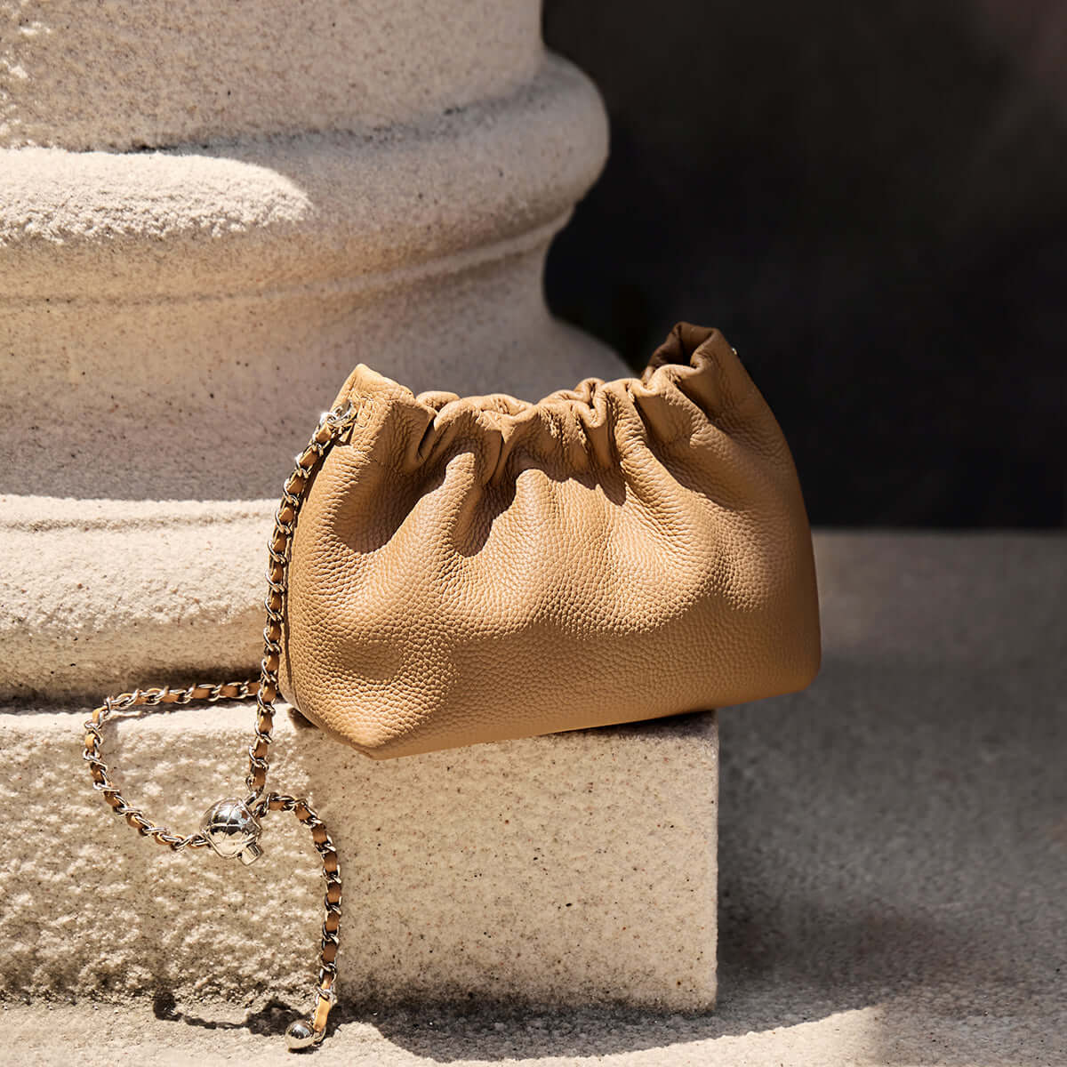 mini dumpling clutch crossbody bag tan 2