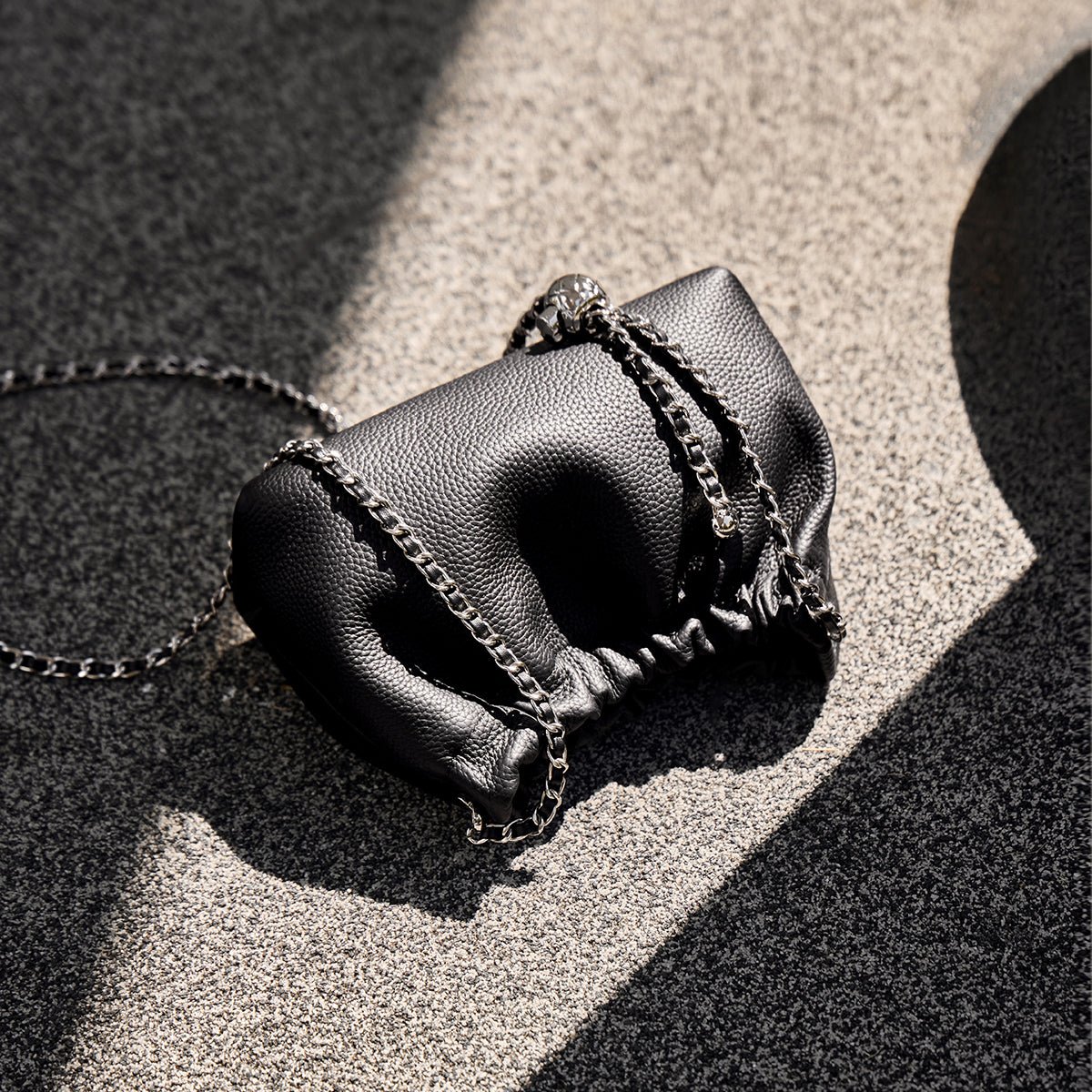 Mini Dumpling Leather Clutch Crossbody Bag
