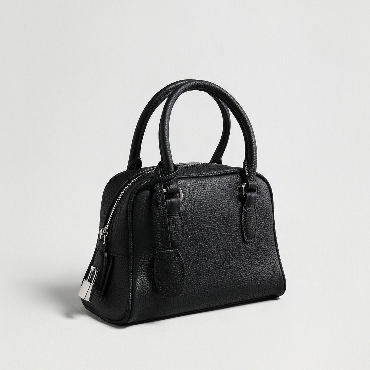 Mini Pebbled Leather Bowling Bag with Padlock Charm – Structured Top-Handle Crossbody Bag