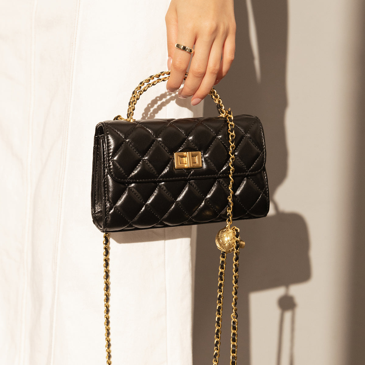 mini-quilted-chain-strap-bag-with-top-handle_black_3.jpg