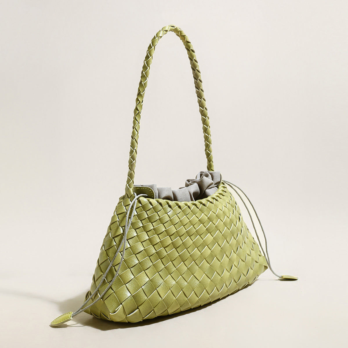 mini woven trapezoid drawstring shoudler bag avocado 2