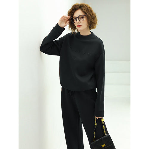 minimalistic long sleeved sweater all black 1