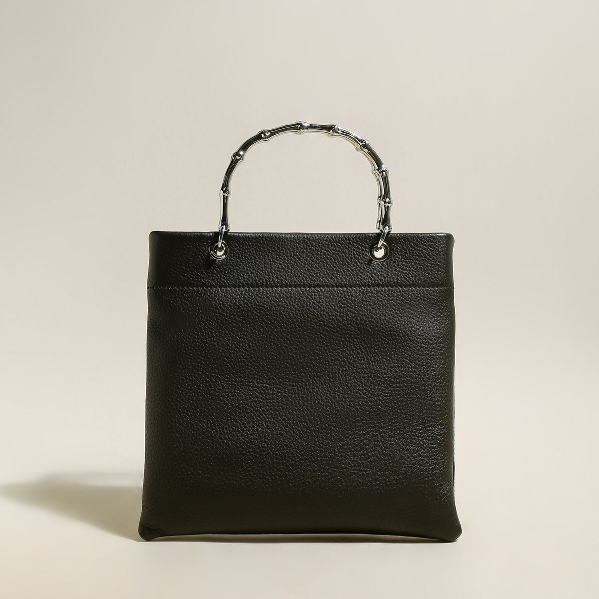 minimalistic square structured top handle bag black 1